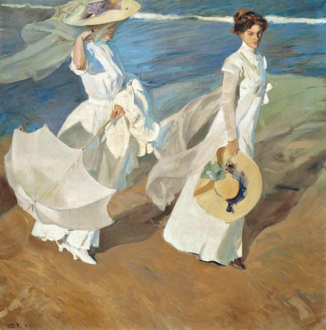 Schilderij Paseo a orillas del mar of Women walking on the beach met twee vrouwen met witte, waaiende jurken die over het strand wandelen. De een draagt een hoed en parasol, de ander heeft de hoed in de hand.